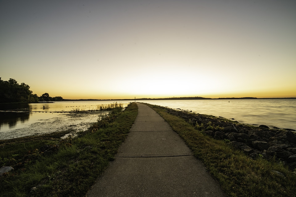Walkway into the lake at sunrise
