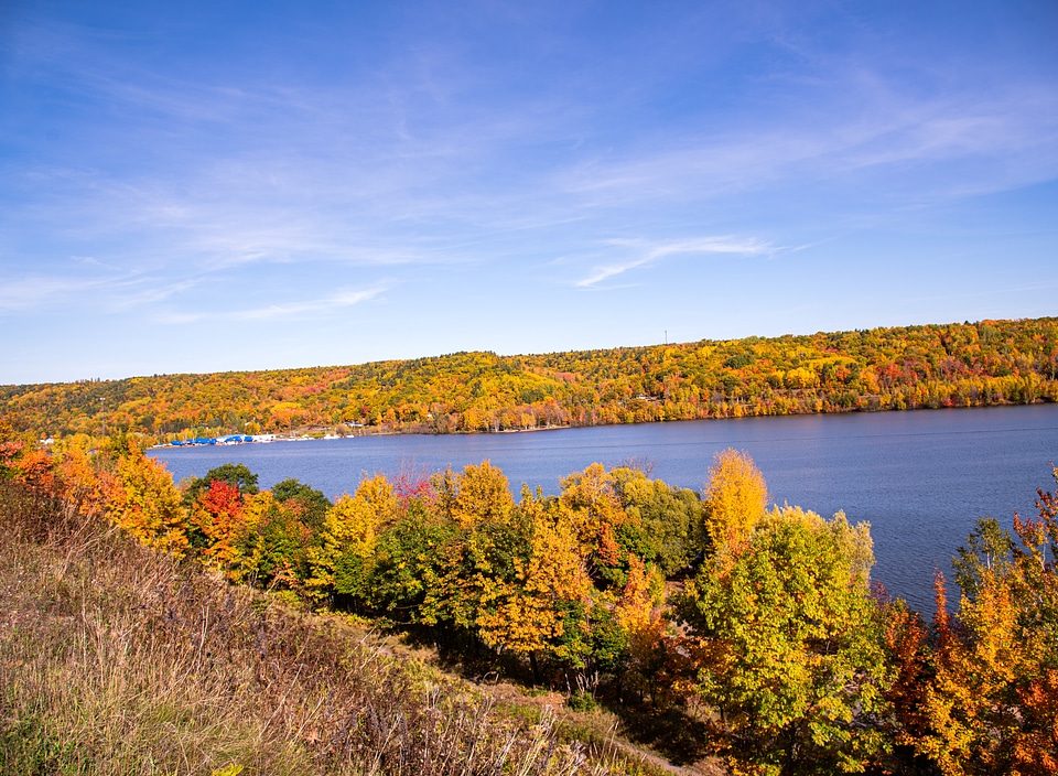 Autumn landscape down the River under the sky