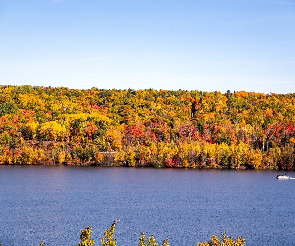 Warm Autumn landscape colors across the river