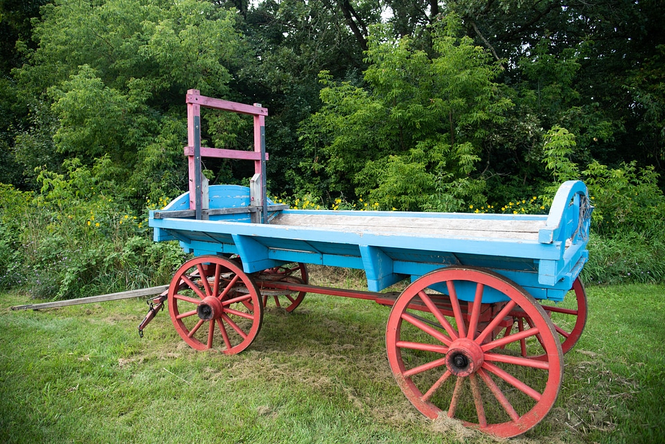 Blue farm cart with Red Wheels