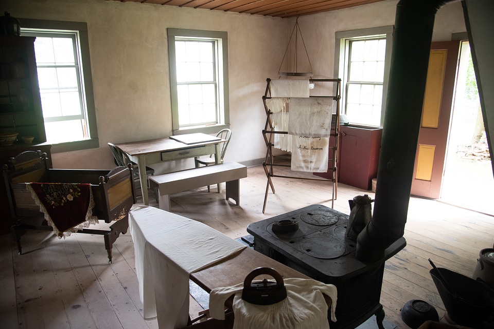 Ironing board, furnace, cradle, and table