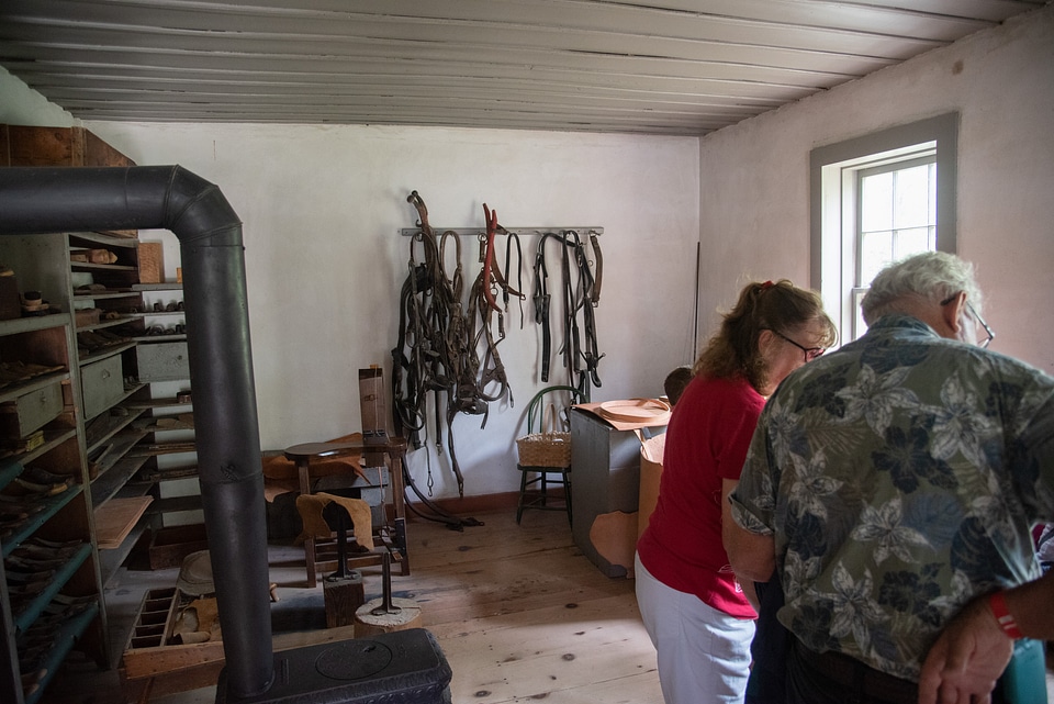 Shoe making room with people