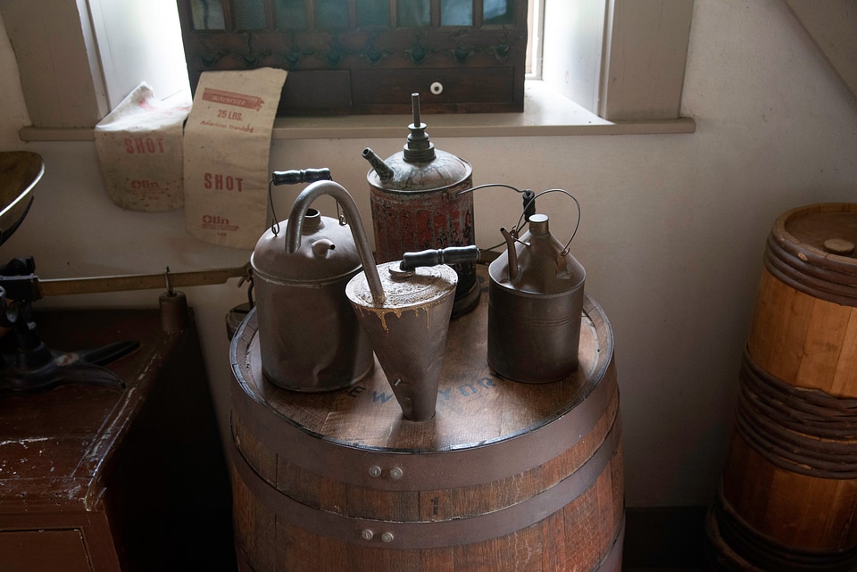 Tea Kettles on top of a Barrel