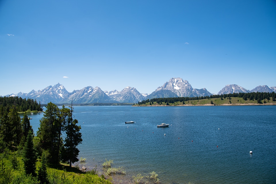 Longer landscape view of Jackson Lake with mountains in the background photo