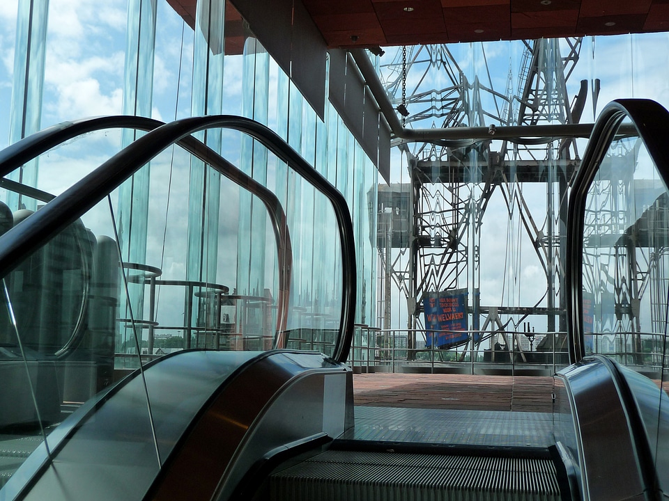 Large glass building and walls in Antwerp, Belgium