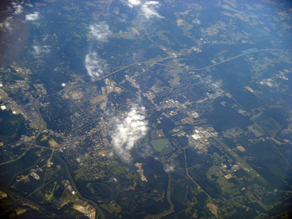Aerial View with clouds and town underneath in Columbus, Mississippi
