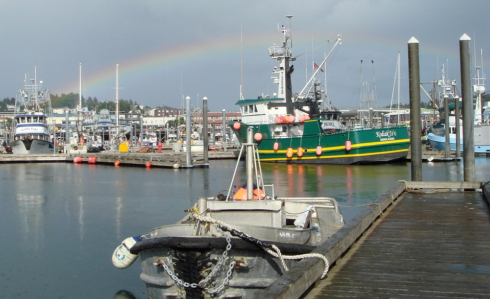 Kodiak Harbor, July 2009 with boats and a rainbow in Alaska photo
