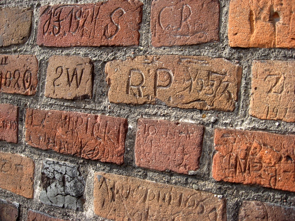 Inscriptions carved on the walls of St. Bartholomew's Church, Konin