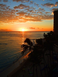 Sunset on Waikiki Beach in Honolulu, Hawaii photo