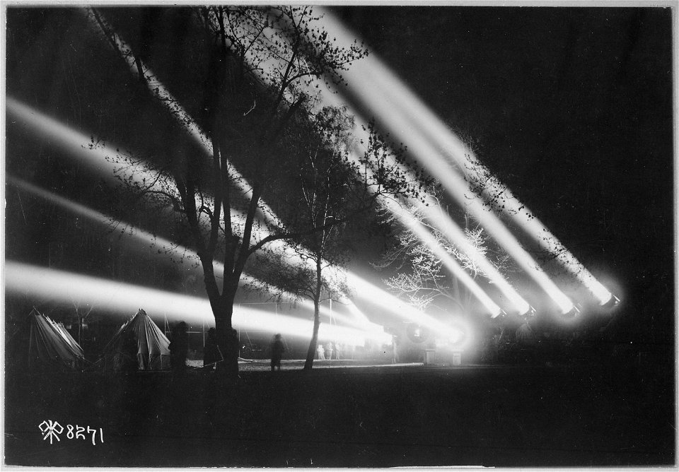Mobile anti-aircraft searchlight, used by Engineer Corps. Night view of illumination from 24 inch searchlights.... - NARA - 530717