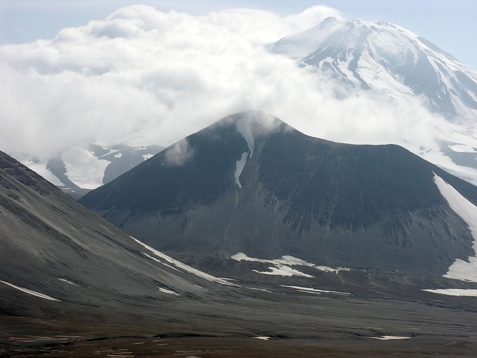 Mountain Landscape with clouds around the Peak