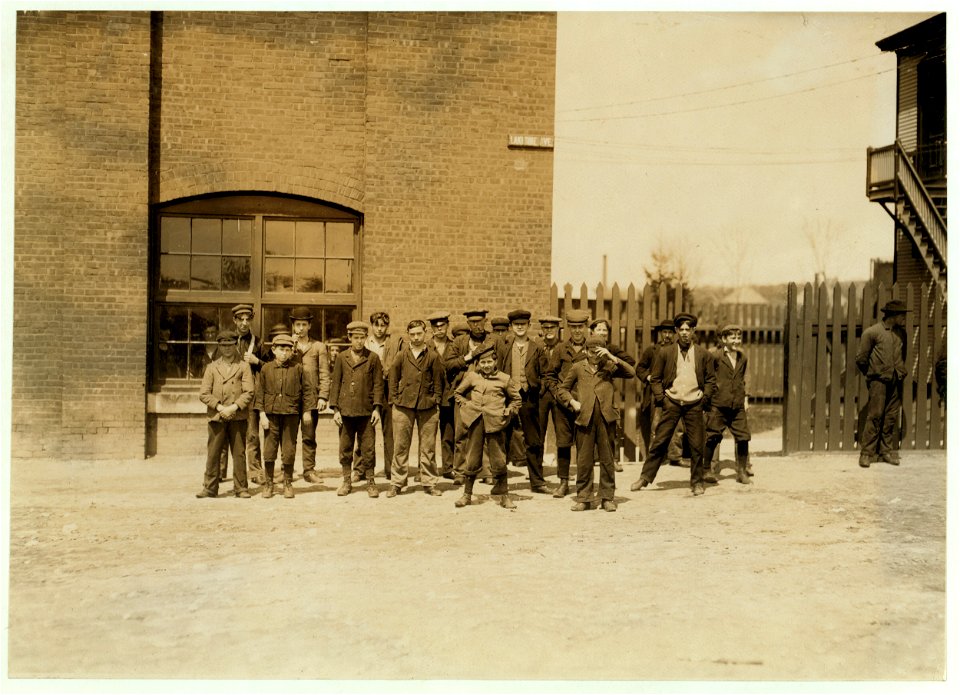 Noon hour at the Queen City Mill, Burlington, Vt. (Not a large mill) About a dozen small boys like the smallest here, names of small ones here are Dorio Charptier, Arthur Tessier. LOC nclc.01722