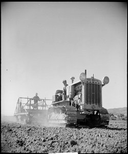 Monterey County, California. Rural youth. Mechanization, the agricultural employee. leveling a field. The fellow on... - NARA - 532176 photo