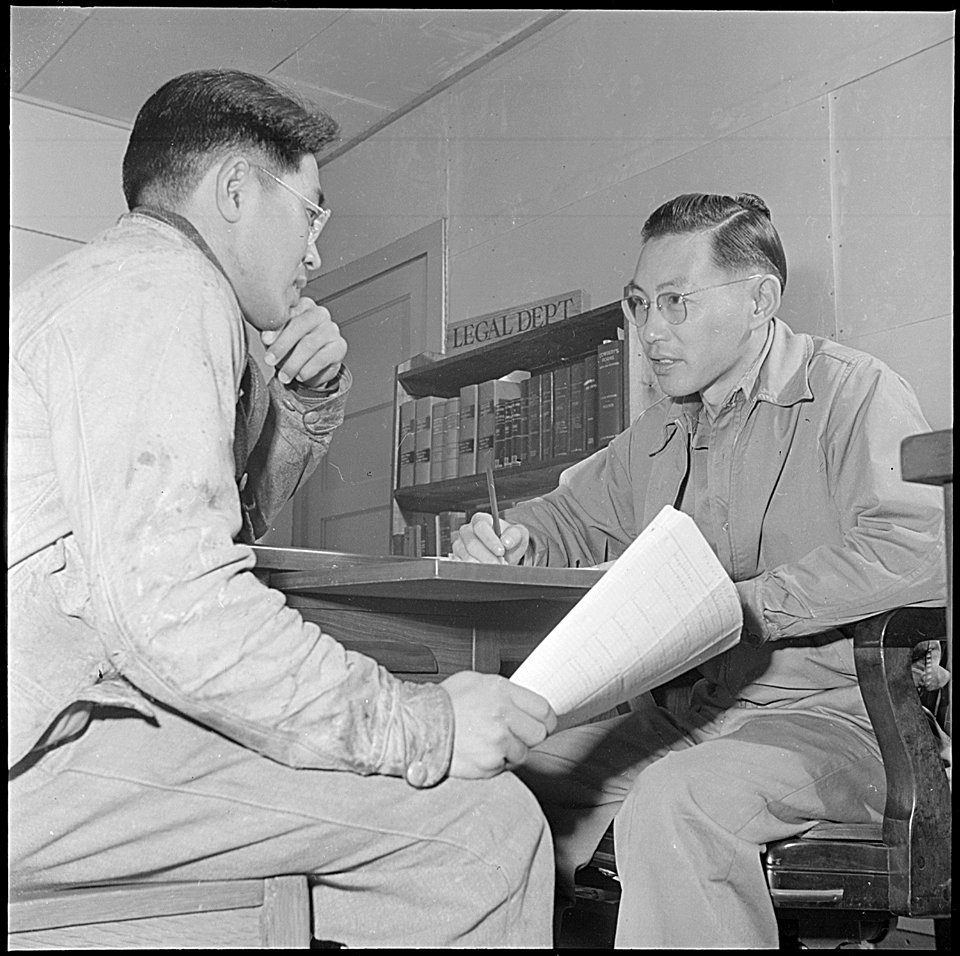 Jerome Relocation Center, Denson, Arkansas. Rene Miyake, member of the legal aid staff, at the Jero . . . - NARA - 539352