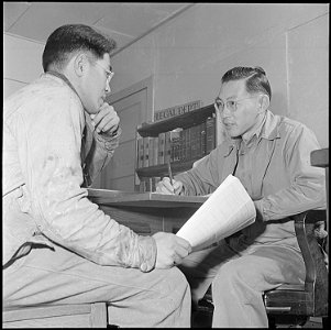 Jerome Relocation Center, Denson, Arkansas. Rene Miyake, member of the legal aid staff, at the Jero . . . - NARA - 539352