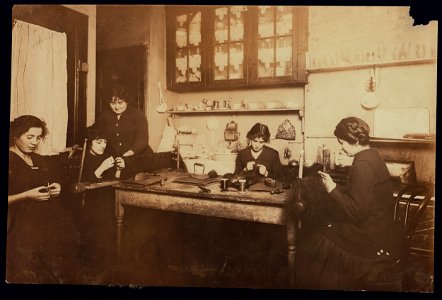 Making hair-goods in the kitchen-living-room of H. Mowshowitz's, a contractor, 178 E. 2nd St., N.Y. The partly made puffs and switches were lying around on the floor. Apartment is small and LOC nclc.04199