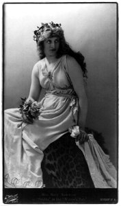 Mary (Anderson) de Navarro, 1859-1940, three-quarter length portrait, seated, facing right, as Perdita in the Winter's Tale LCCN2005685955