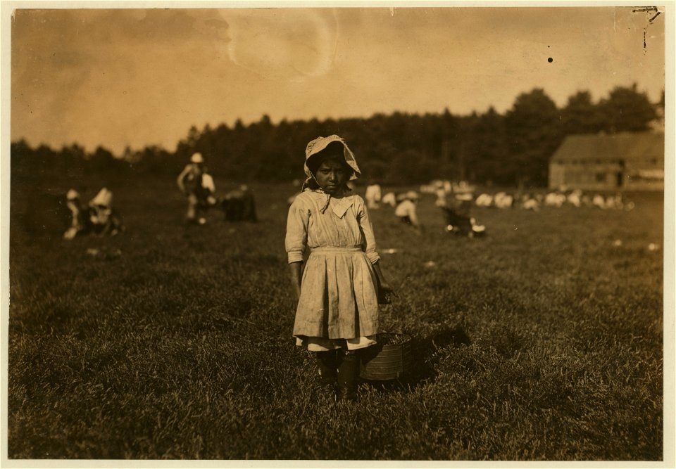 Mary Gilbert carrying cranberries. Said 10 years old. LOC nclc.00145