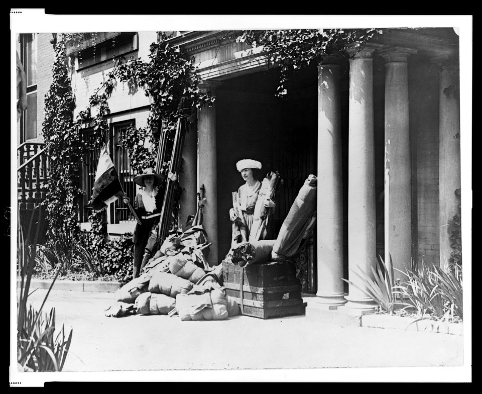 Miss Julia Emory and Miss Bertha Graf with luggage and flags, leaving Washington, D.C. for a suffrage demonstration at Marion, Ohio, the home of Warren Harding LCCN99471559