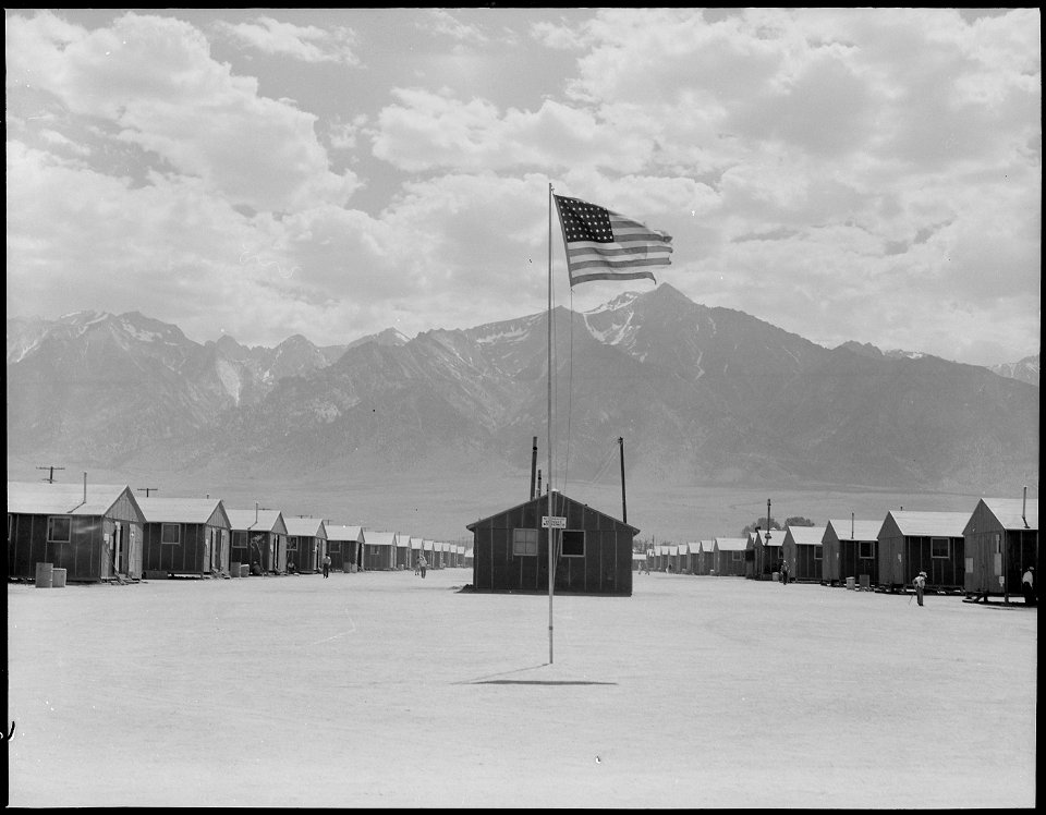 Manzanar Relocation Center, Manzanar, California. Street scene of barrack homes at this War Relocat . . . - NARA - 538128