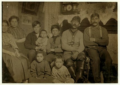 Manuel Sousa and family, 306-2(nd) St., On right end is brother-in-law; next (to) him is father who works on the river; next is Manuel (appears to be 12 years old) wearing sweater and has LOC cph.3b12096 photo