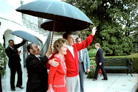 President Ronald Reagan and Nancy Reagan returning home to the White House from George Washington Hospital photo