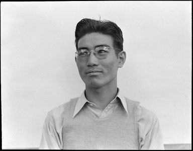Manzanar Relocation Center, Manzanar, California. Henry Ishizuka, graduate of University of Califor . . . - NARA - 537996 photo