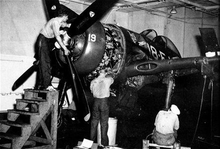 Maintenance on a Grumman F8F-1 of VF-18 aboard USS Leyte (CV-32) in 1946