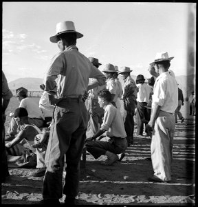 Manzanar Relocation Center, Manzanar, California. Evacuees of Japanese ancestry are enjoying a base . . . - NARA - 538067
