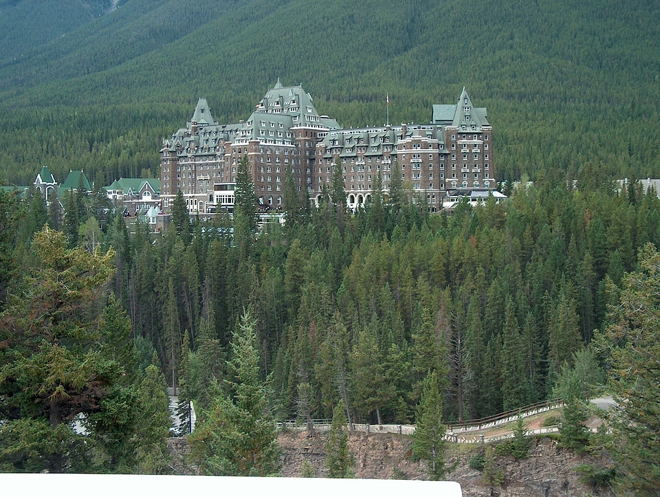Banff Springs Hotel in the trees in Banff National Park, Alberta, Canada