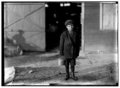 Monongah Glass Co., Fairmont, W. Va. Jo Before a glass wks boy going home, 5 P.M. He says he is 12 years old, and has been at it one year- is a 'ketchin-up-boy' $.70 a day- says glass LOC cph.3a21698