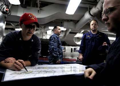 Marking a damage control chart 120404-N-WD757-039