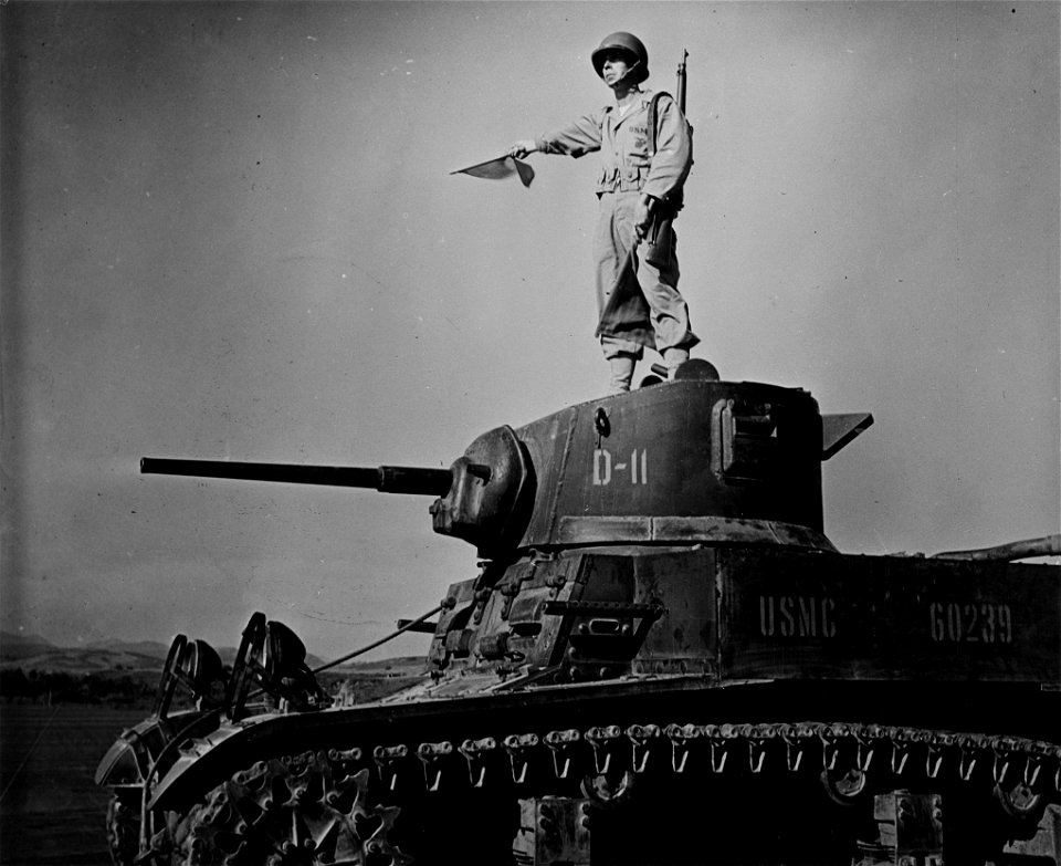 Marine signalman on M3 Stuart tank 1942