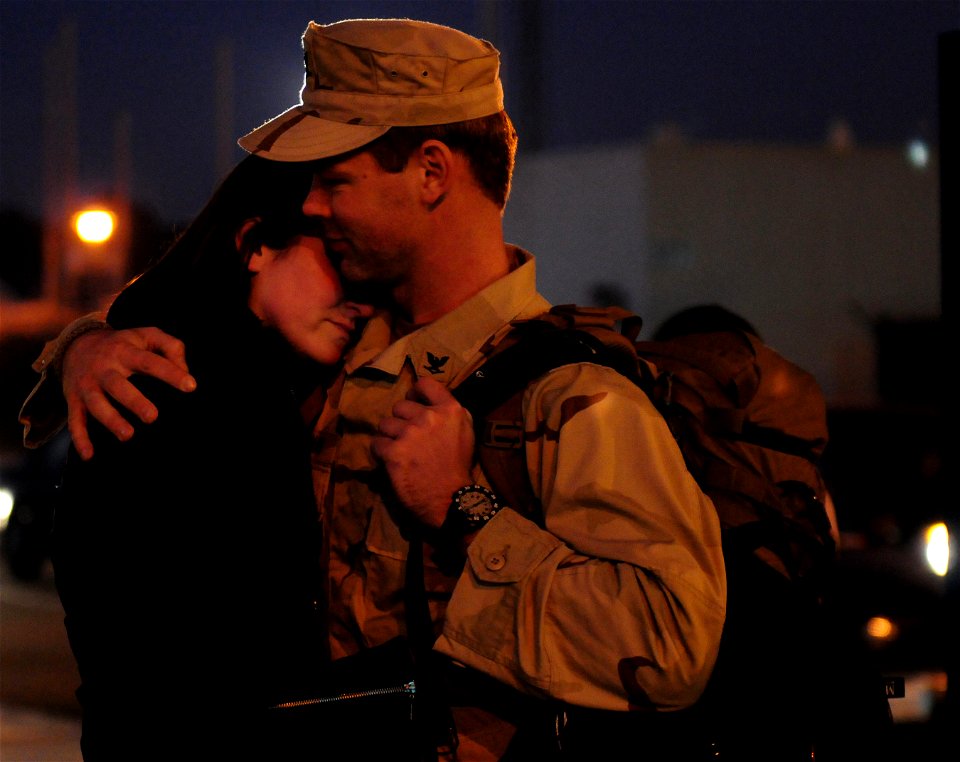 US Navy 111130-N-RG587-092 A Sailor says goodbye to his wife before the Nimitz-class aircraft carrier USS Carl Vinson (CVN 70) departs Naval Air S