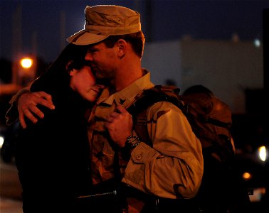 US Navy 111130-N-RG587-092 A Sailor says goodbye to his wife before the Nimitz-class aircraft carrier USS Carl Vinson (CVN 70) departs Naval Air S
