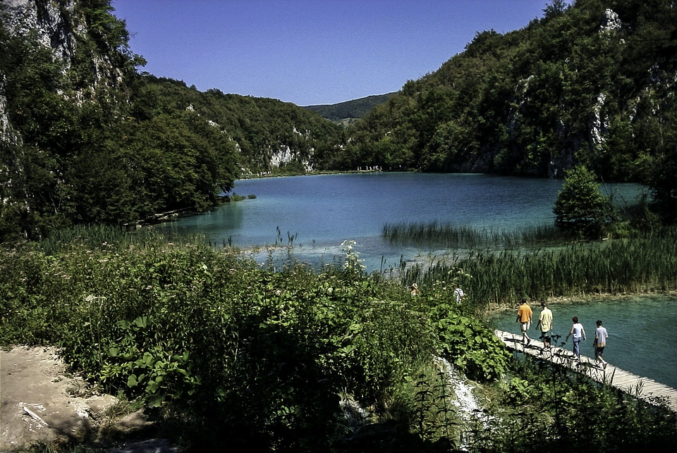 Walking on wooden footbridges at Plitvice Lakes National Park, Croatia