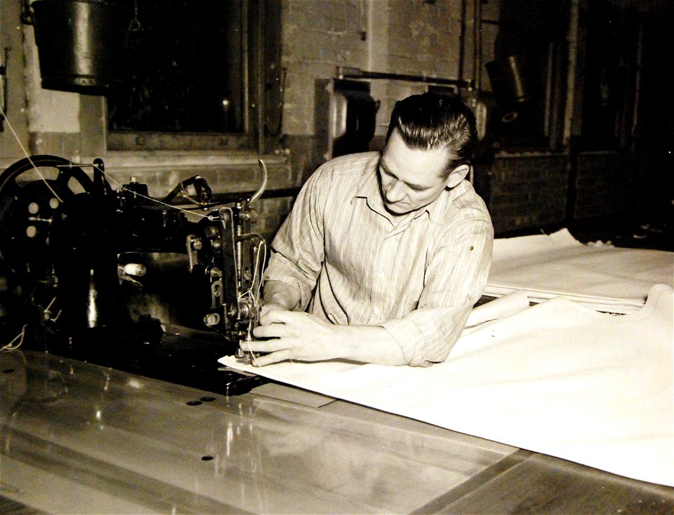 Making a ship's hammock in Brooklyn Navy Yard, New York City (26362214801)