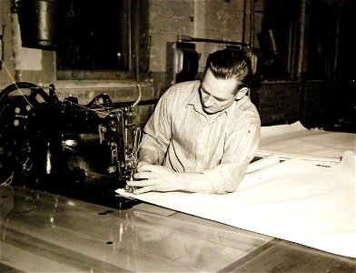 Making a ship's hammock in Brooklyn Navy Yard, New York City (26362214801)