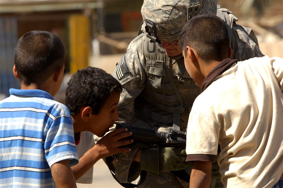 MND-B Soldiers, INP conduct information dissemination, mingle with kids DVIDS121093
