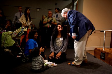 Mary Ignatius on the floor with her son Lucas Lancerin, 2014
