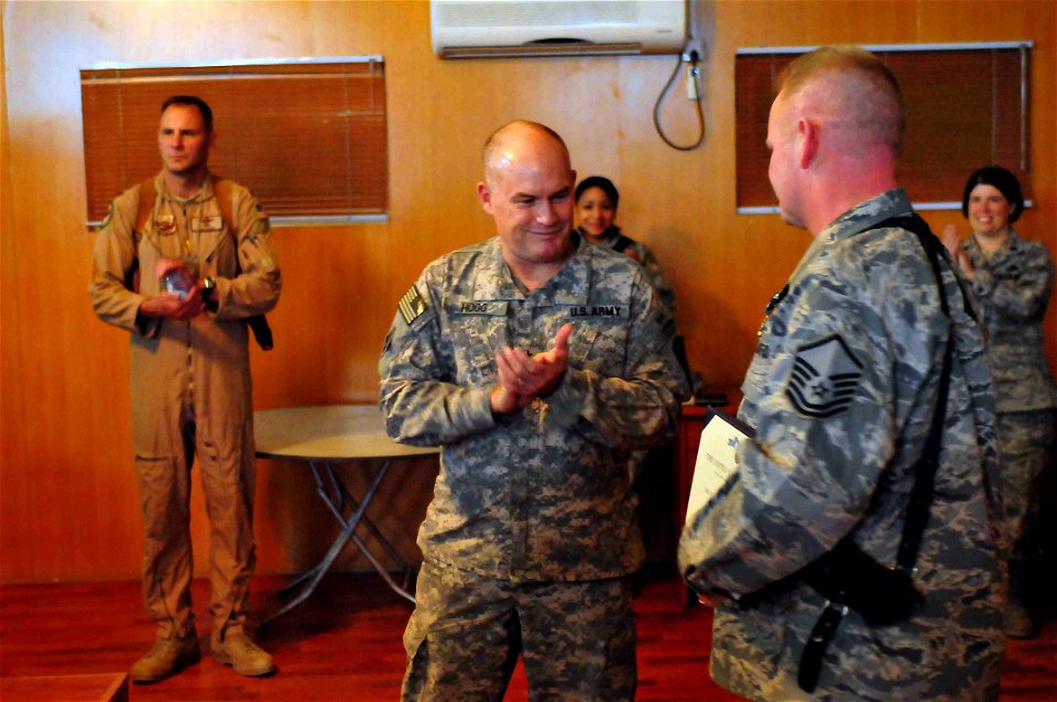 Maj. Gen. David Hogg presents a Joint Service Achievement medal to Master Sergeant John Wood (4525595896)