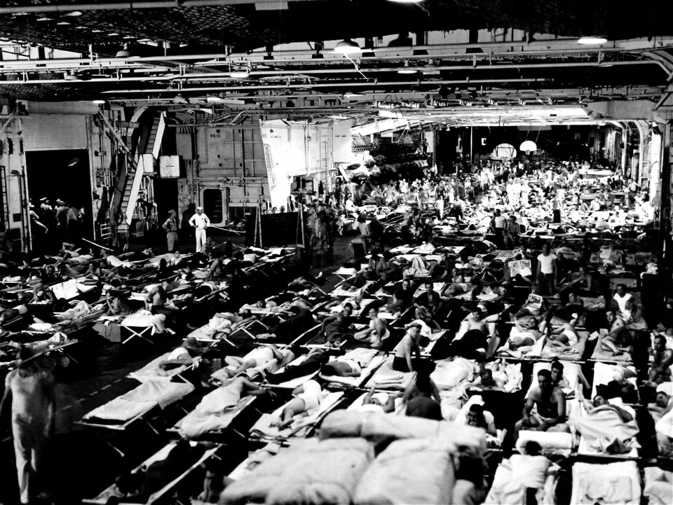 Hangar of USS Enterprise (CV-6) during a Magic Carpet voyage, in September 1945 (80-G-495657)