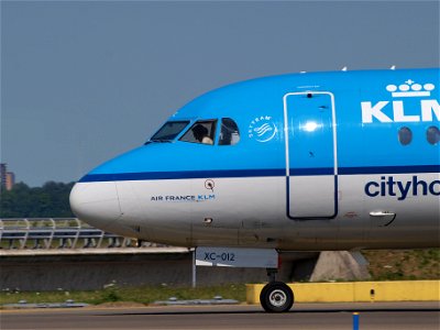 PH-WXC KLM Cityhopper Fokker F70 - cn 11574, taxiing 21july2013 pic-003 photo