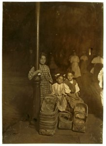 Marie Costa, Basket Seller, 605 Elm St., Sixth St. Market, Cincinnati. 9 P.M. Had been there since 10 A.M. Sister and friend help her. LOC cph.3b03842 photo