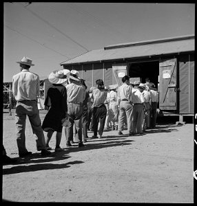 Manzanar Relocation Center, Manzanar, California. Evacuees of Japanese ancestry at this War Relocat . . . - NARA - 537970 photo