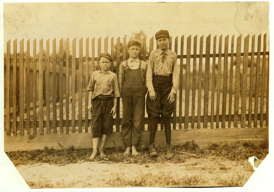 Noon at Delta Cotton Mills, Mc Comb, Miss. Three of the young workers. LOC nclc.02072
