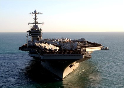 US Navy 090702-N-9565D-104 Sailors man the rails aboard the Nimitz-class aircraft carrier USS George Washington (CVN 73) during her transit off the coast of Fremantle, Australia before a port visit