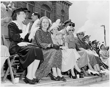 Mary Jane Truman, Margaret Truman, Bess Truman, and others watch a parade in Bolivar, Missouri. President Harry S.... - NARA - 199907 photo