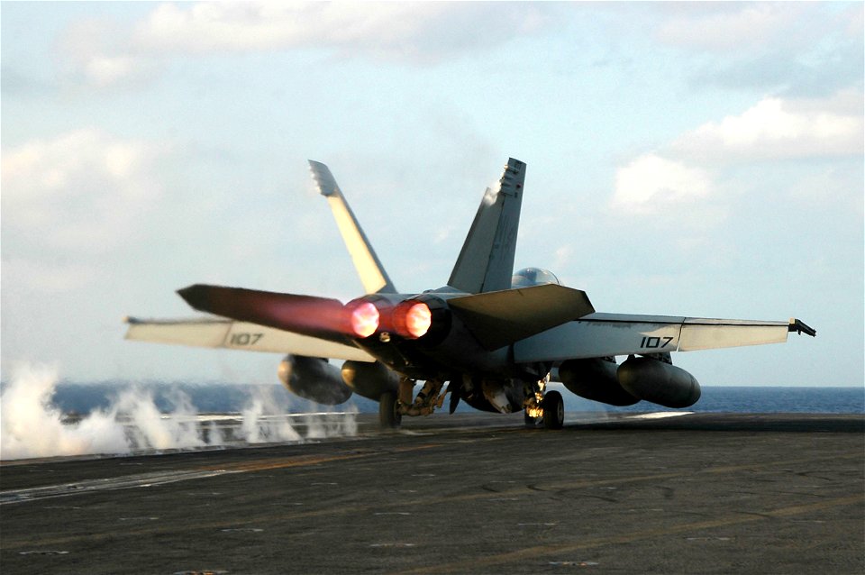 US Navy 061024-N-6106R-039 An F-A-18F Super Hornet assigned to Strike Fighter Squadron One Zero Two (VFA-102), launches off the flight deck of USS Kitty Hawk (CV 63)