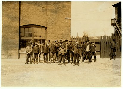 Noon hour at the Queen City Mill, Burlington, Vt. (Not a large mill) About a dozen small boys like the smallest here, names of small ones here are Dorio Charptier, Arthur Tessier. LOC nclc.01722 photo